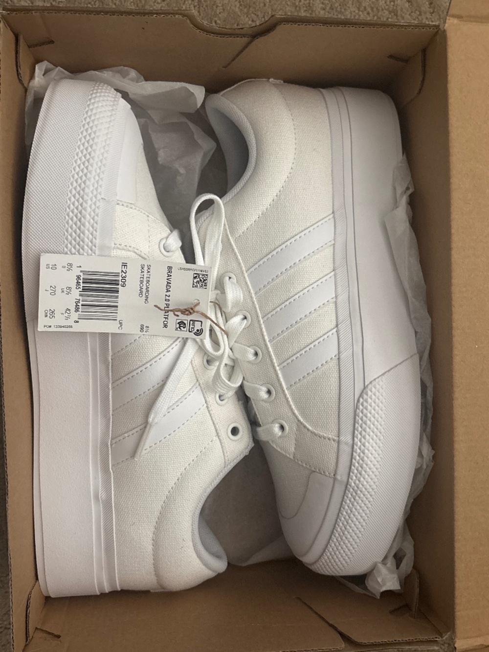 Adidas white sneakers, Bravada 2.0 platforms